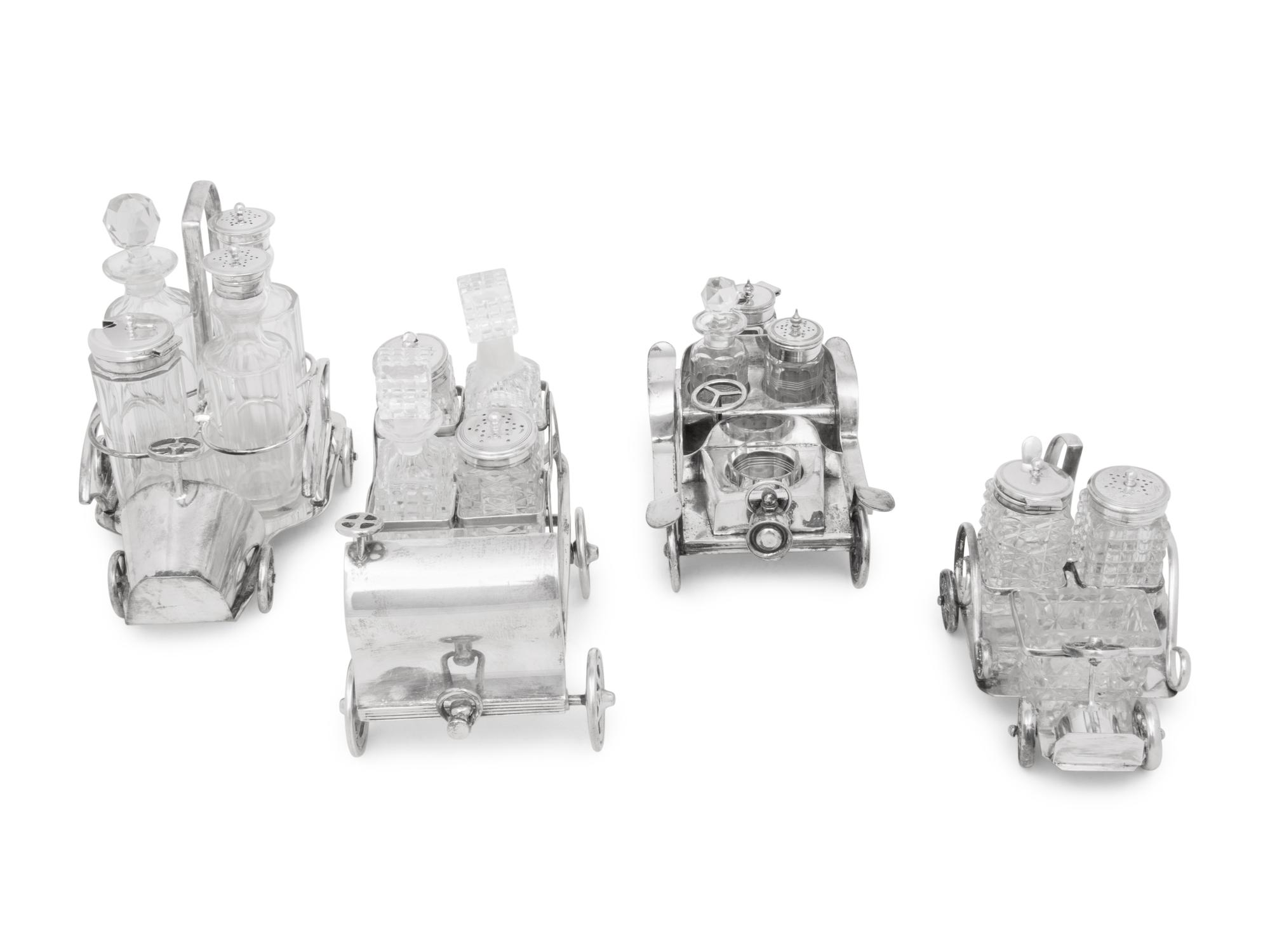 A Group of Four Silver-Plate Automotive Themed Cruet Sets