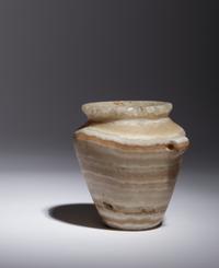 An Egyptian Alabaster Lug Handled Jar