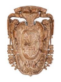 A Baroque Style Carved Wood Cartouche-Form Armorial Plaque