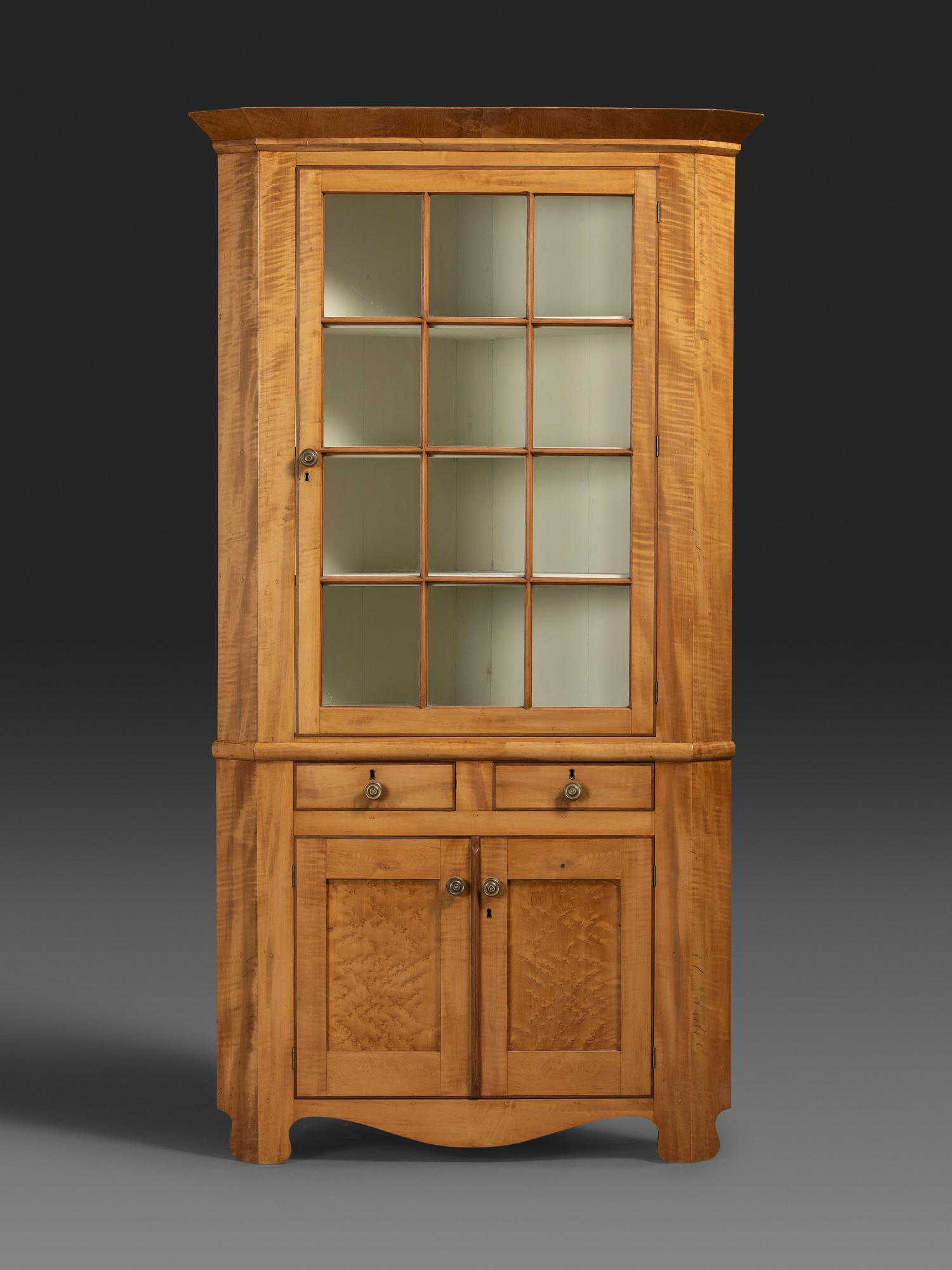 A Country Federal Bird’s Eye and Tiger Maple Corner Cupboard