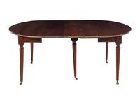 A French Brass Mounted Mahogany Drop-Leaf Dining Table
