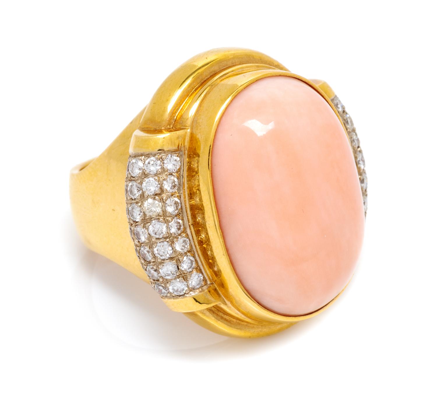 An 18 Karat Yellow Gold, Angel Skin Coral and Diamond Ring, Susan Berman, 18.00 dwts.