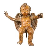 A Carved and Painted Wood Figure of a Cherub Height 18 inches. — 18TH/19TH CENTURY