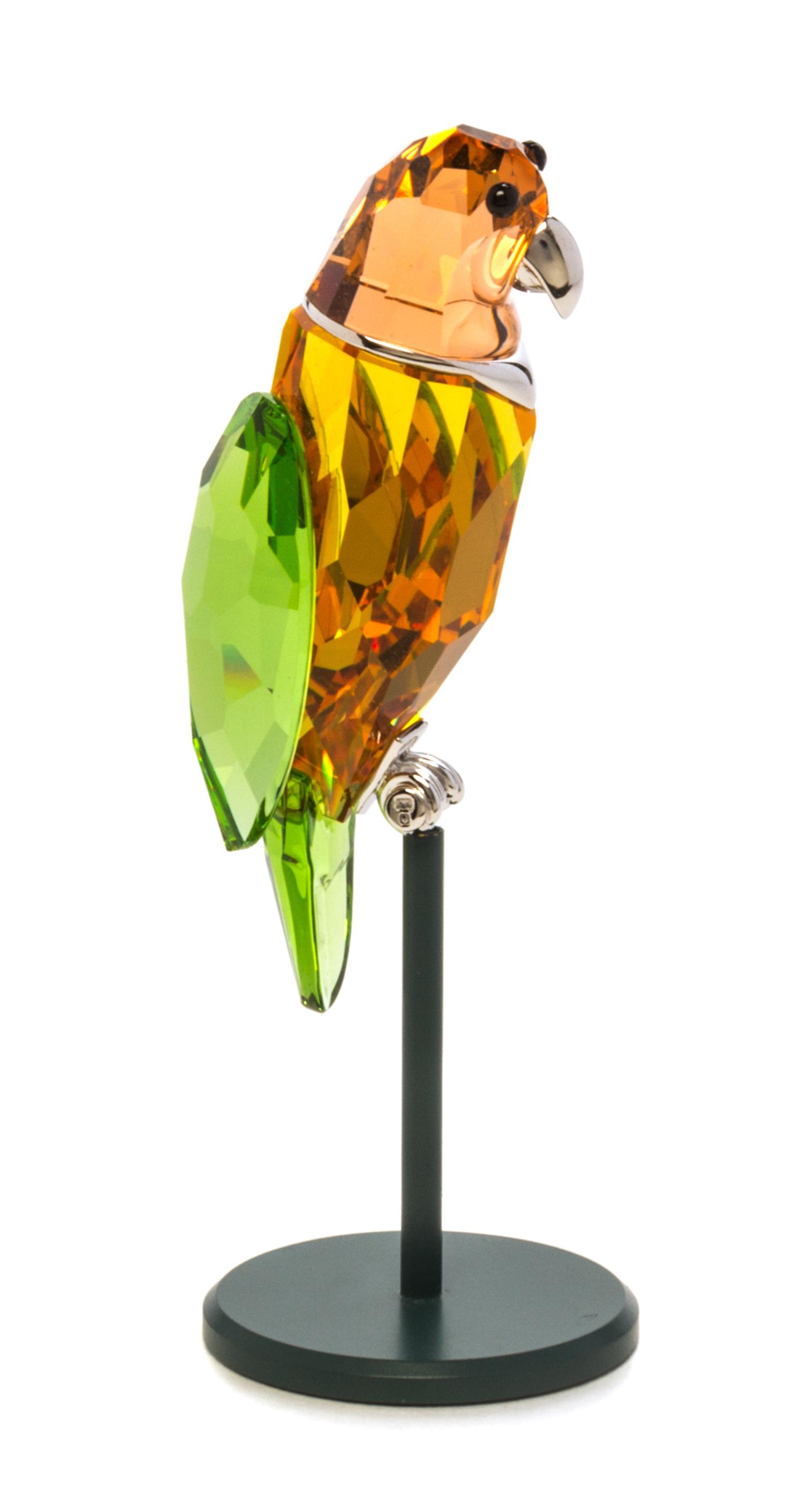 A Swarovski Model of a Parrot Height 2 5/8 inches.
