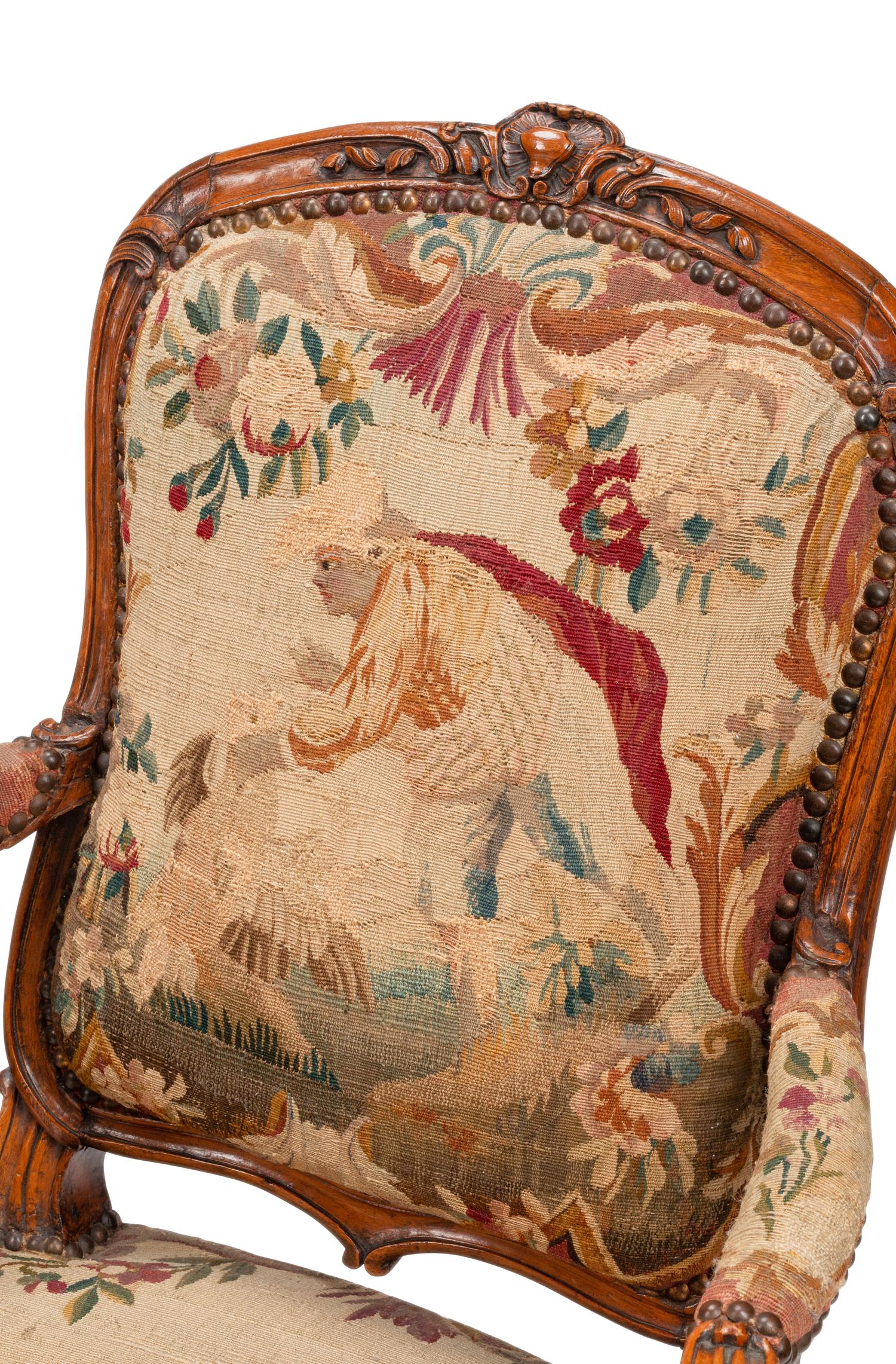 A Set of Four Louis XV Beechwood Fauteuils