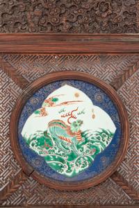 A Famille Verte Porcelain Plaque Inset Wood Wall Panel