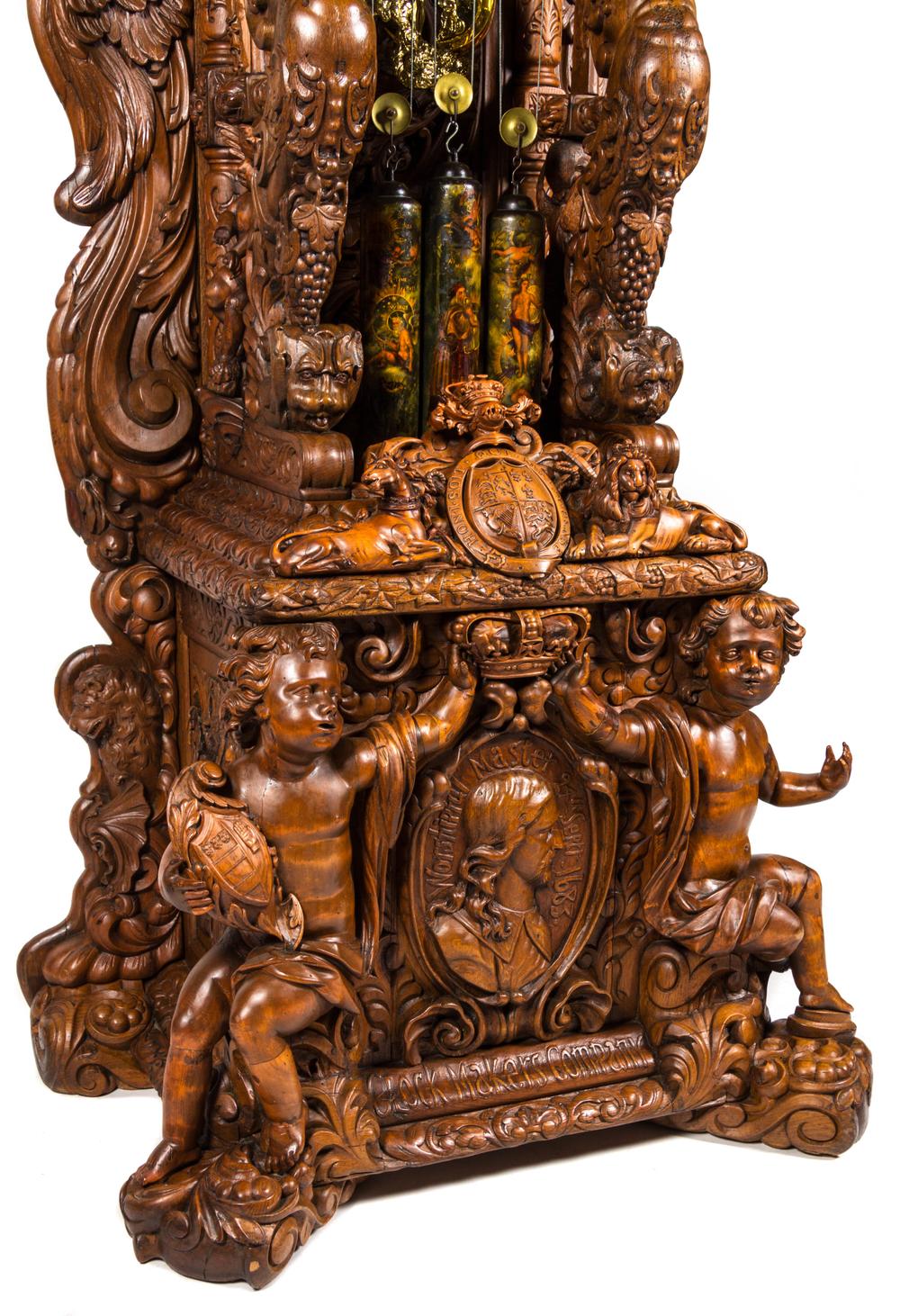 A Monumental English Carved Oak Tall Case Clock, LAST QUARTER 19TH CENTURY, Height 130 1/2 x width 48 x depth 33 inches.