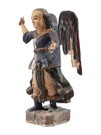 A Carved Polychrome Wood Santo Figure of San Miguel