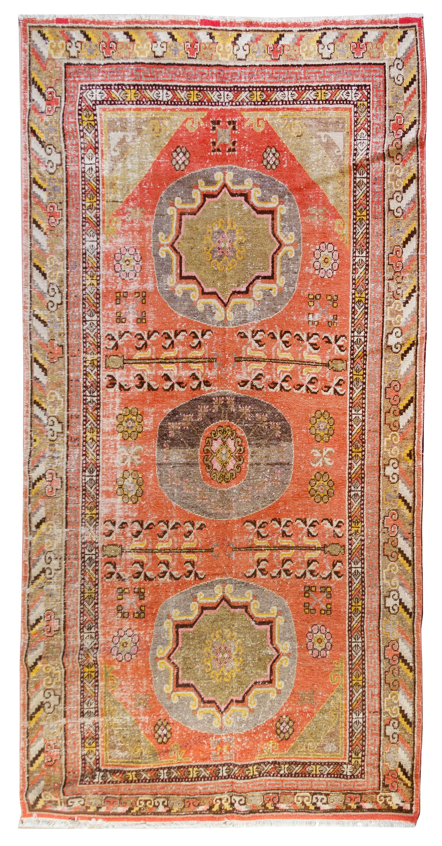 A Khotan Wool Rug 10 feet x 5 feet 2 inches. — EAST TURKESTAN, LATE 19TH CENTURY