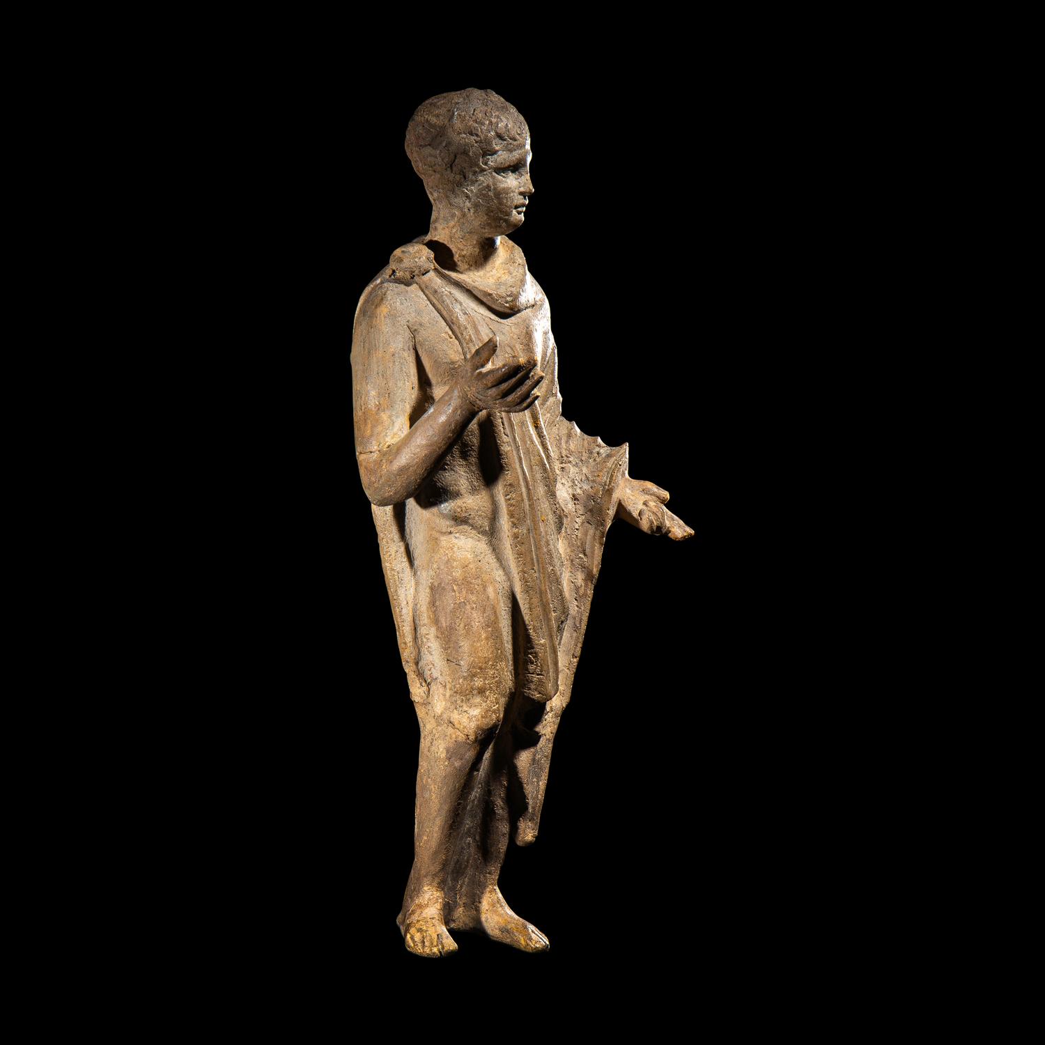 A Roman Terracotta Figure of a Youth