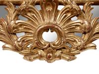 A Pair of Rococo Revival Giltwood Mirrors