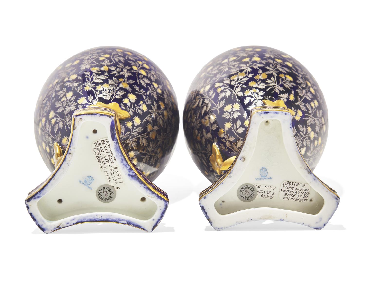 A Pair of Wedgwood Parcel Gilt Porcelain Covered Urns