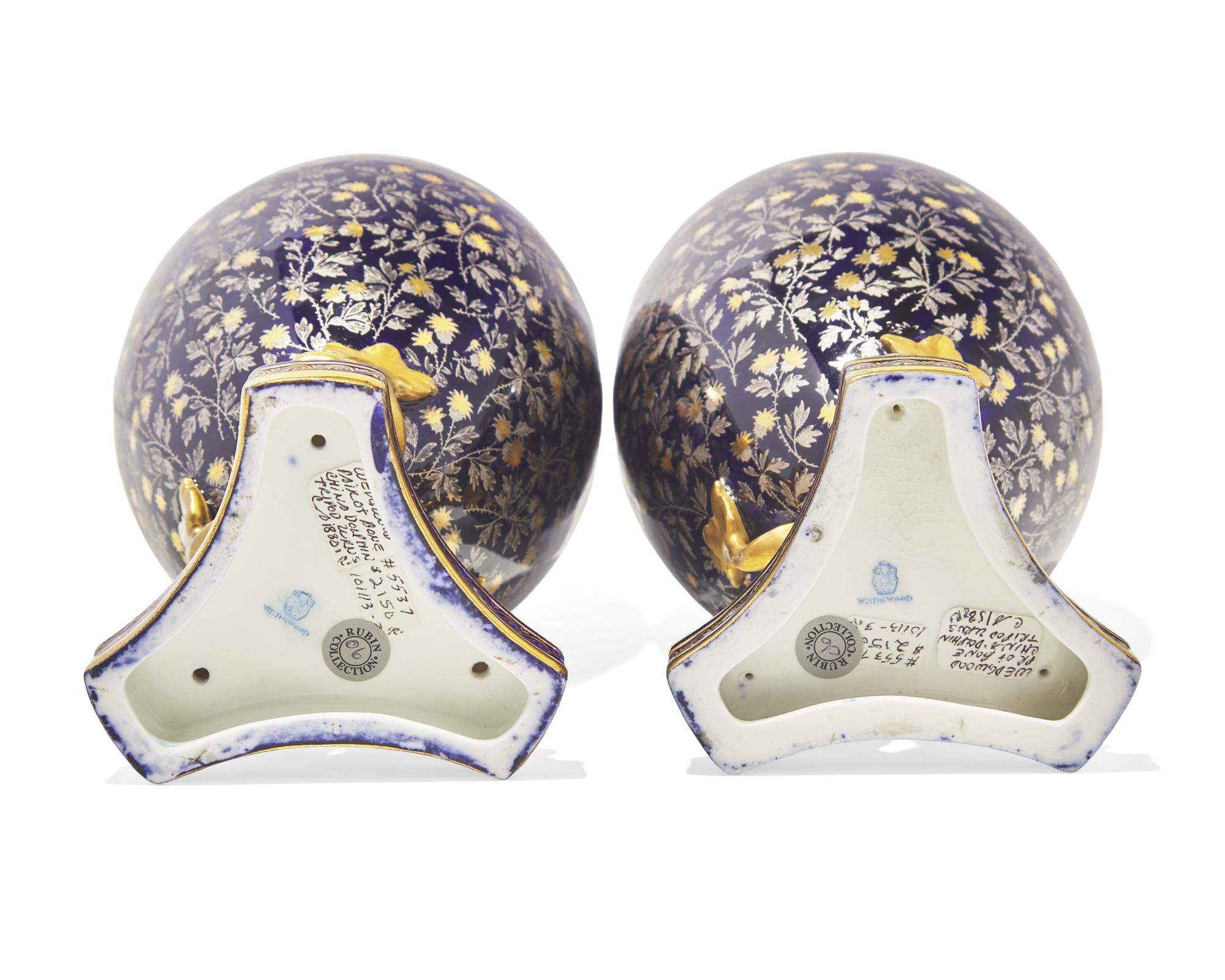 A Pair of Wedgwood Parcel Gilt Porcelain Covered Urns