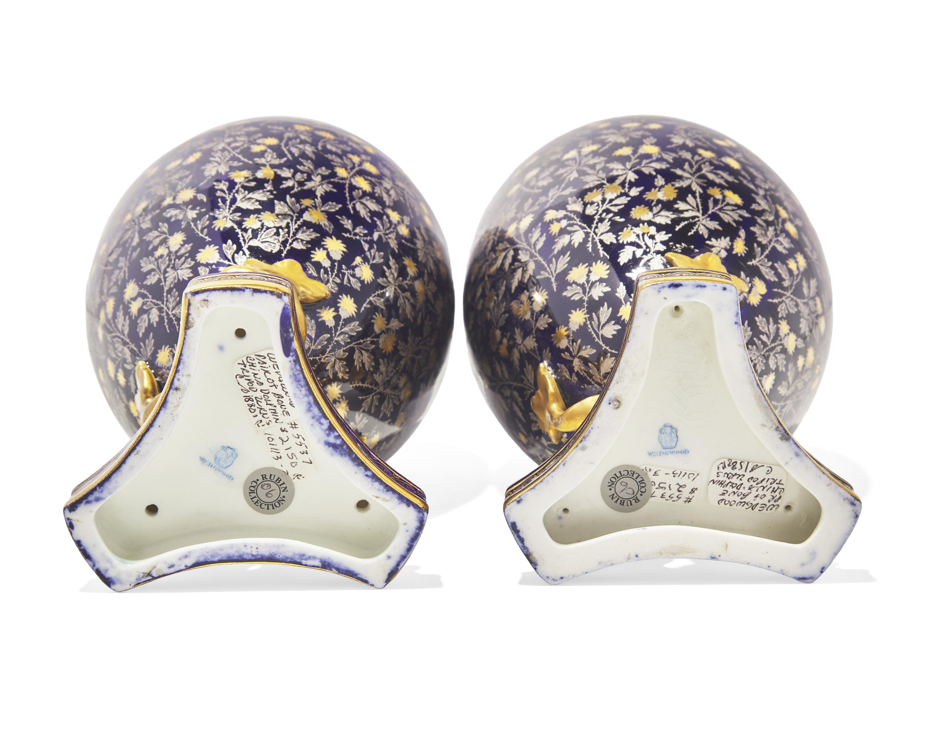 A Pair of Wedgwood Parcel Gilt Porcelain Covered Urns
