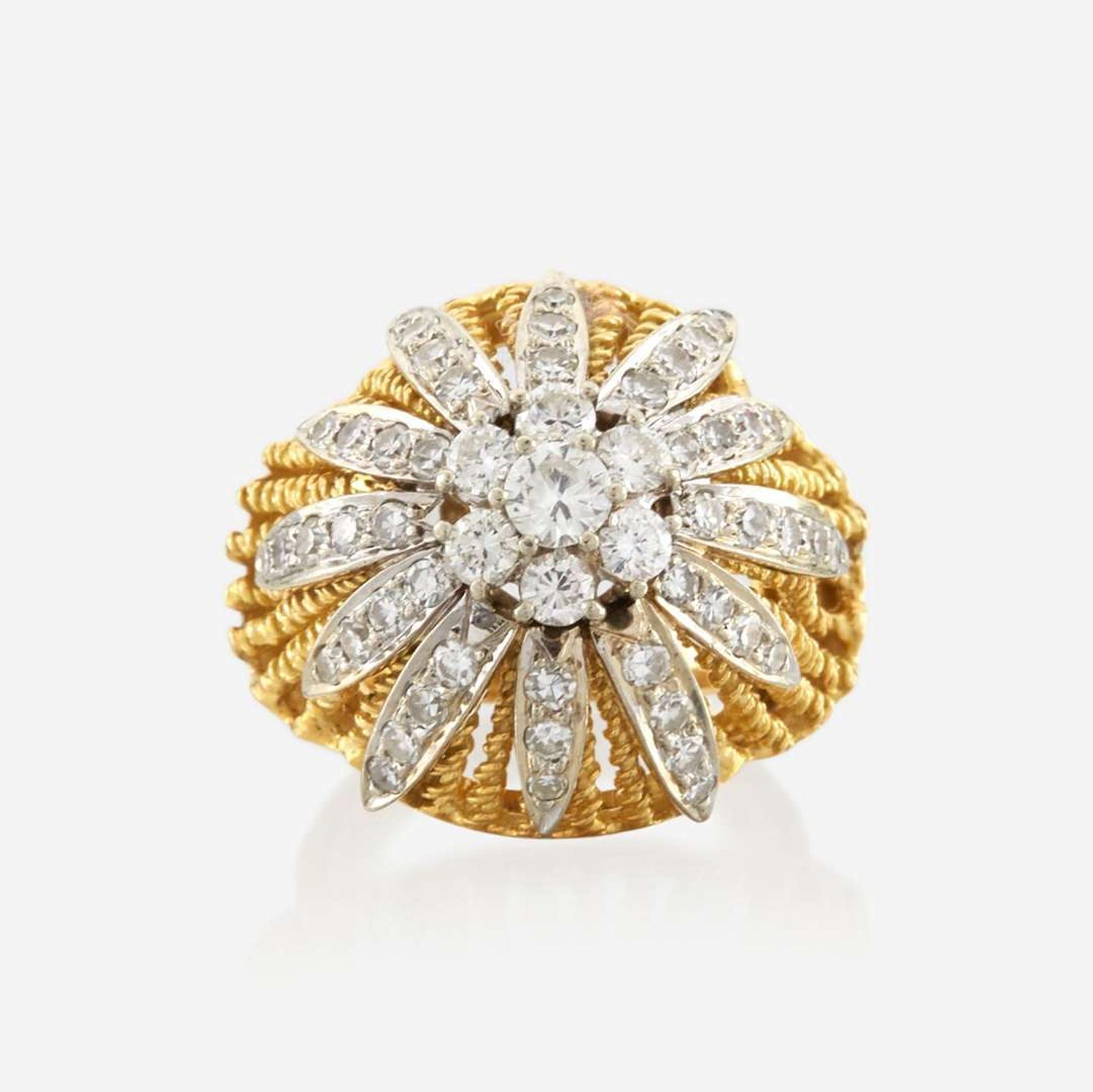 A bicolor gold and diamond ring