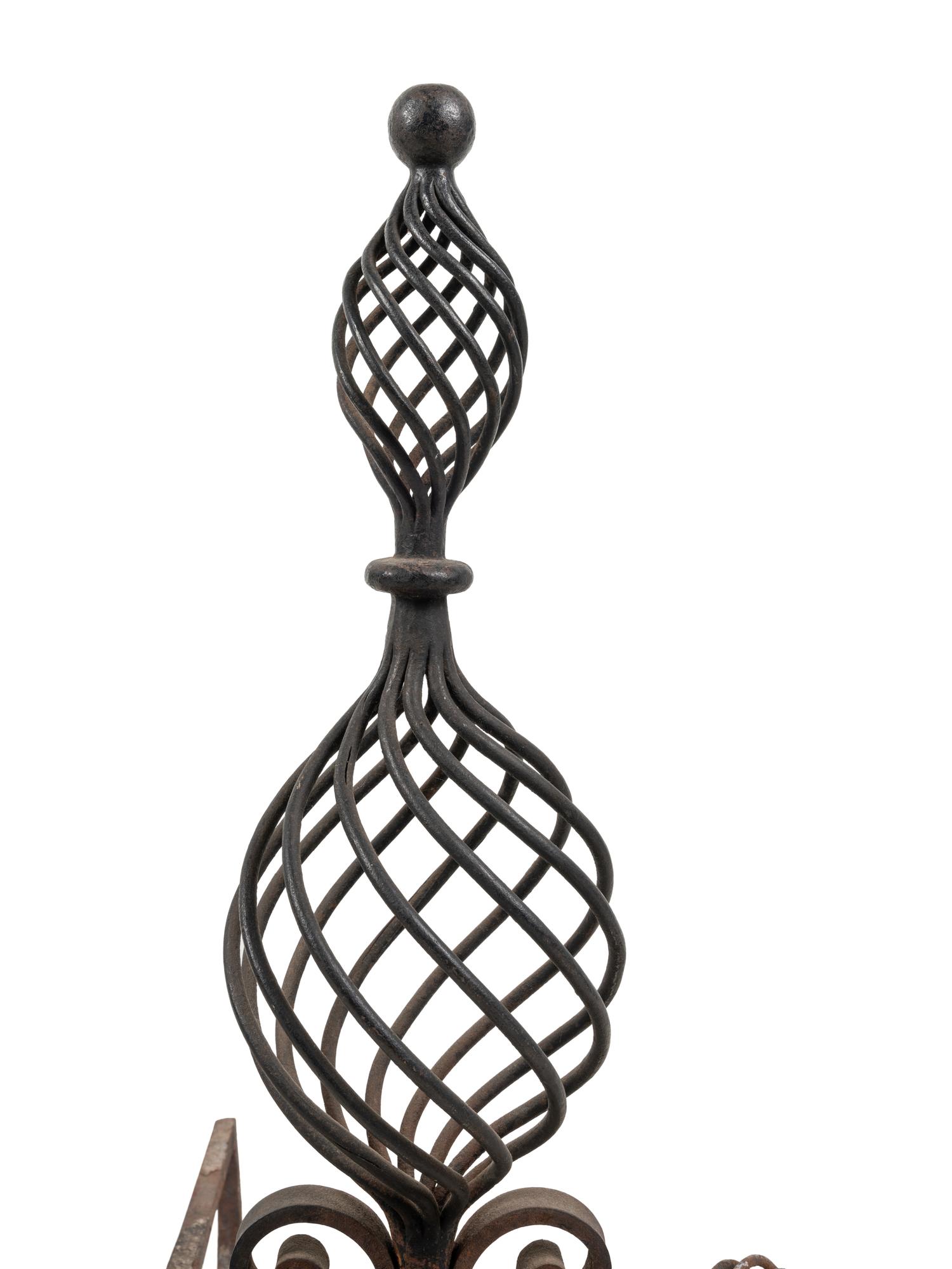 A Pair of Continental Iron Baluster-Twist Andirons