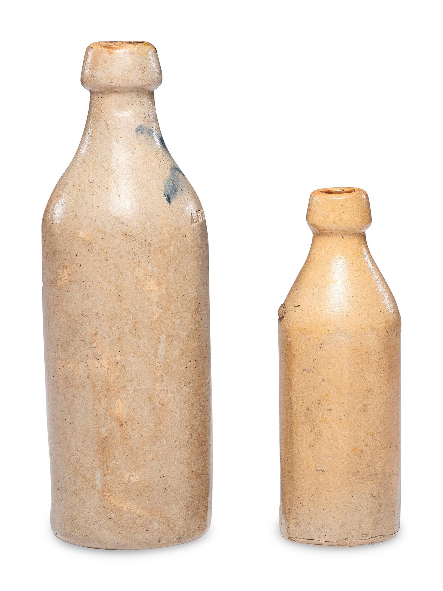 Two Stoneware Beer Bottles