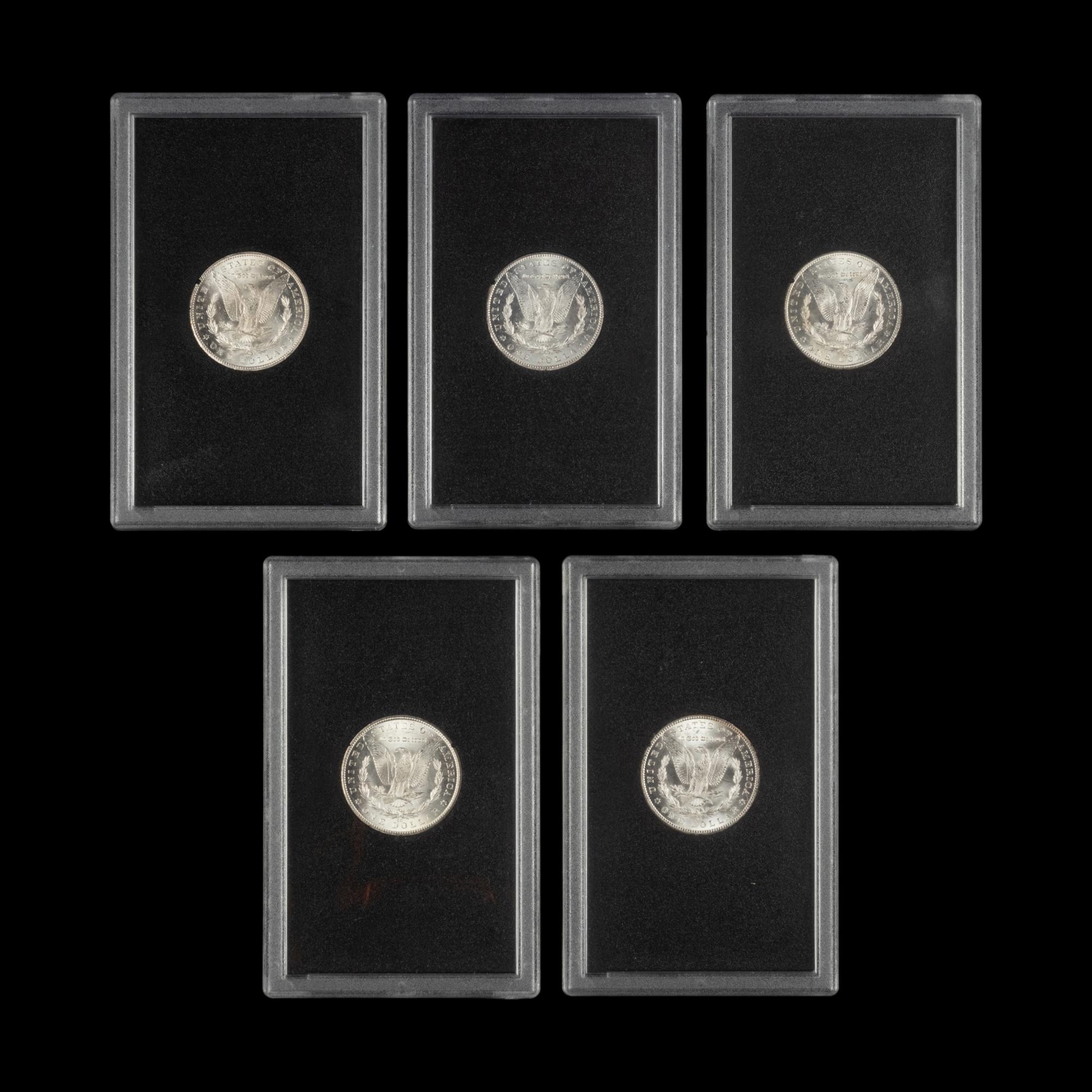 A Group of Five 1884-CC GSA: Morgan $1 Coins