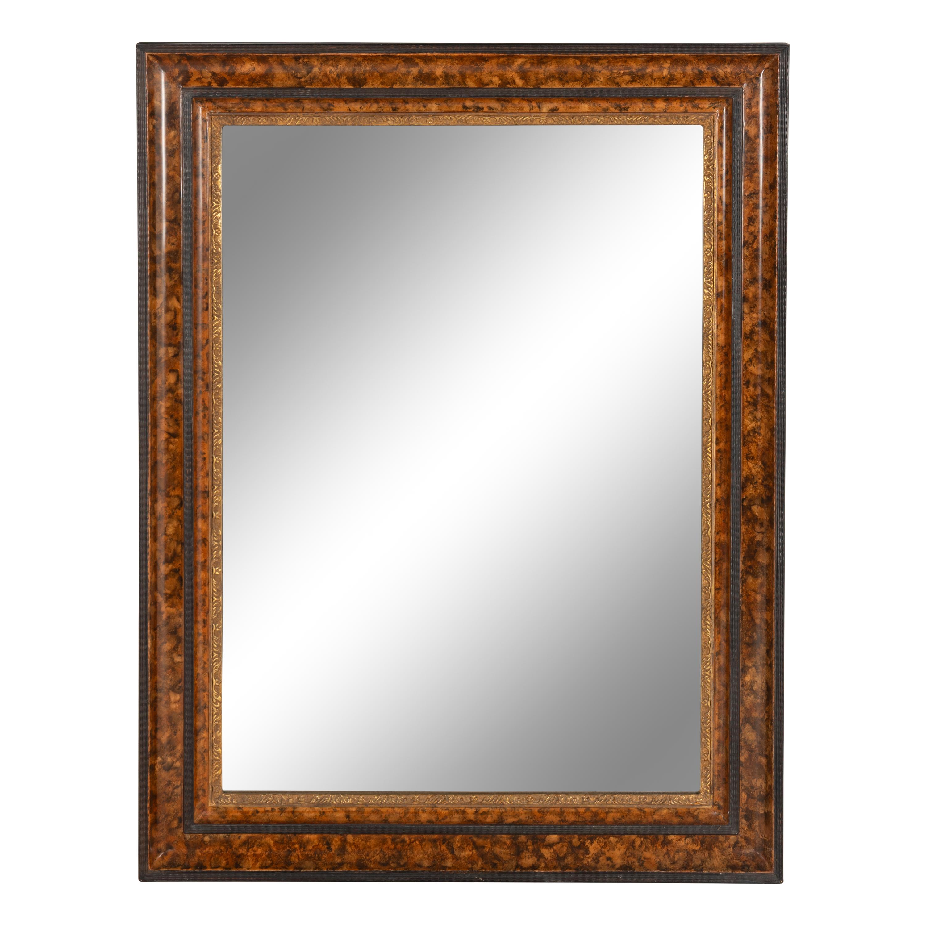 A Dutch Style Grain-Painted, Parcel Gilt and Ripple-Molded Mirror