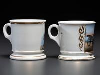 Two Porcelain Occupational Shaving Mugs with Horse-Drawn Wagons