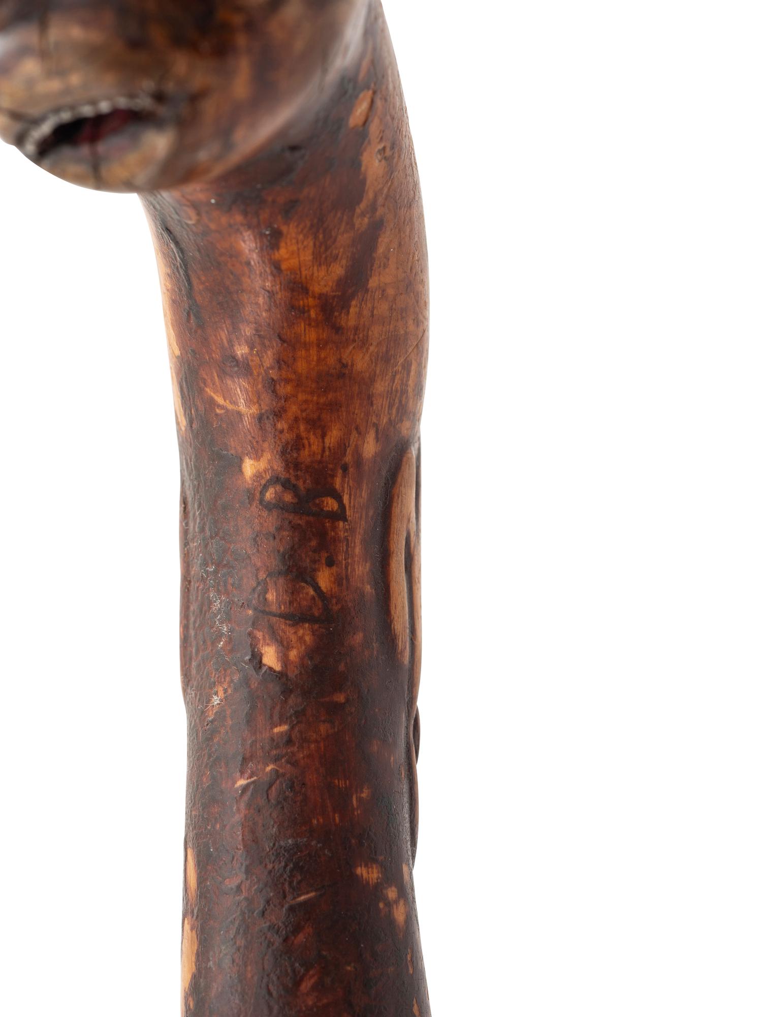 A Folk Art Carved and Painted Wood Jazz Walking Stick