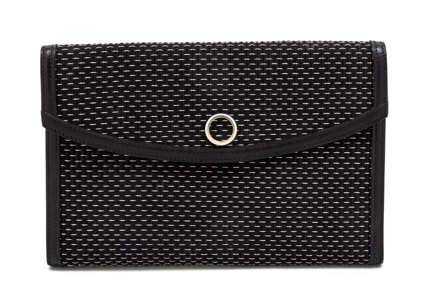 An Hermes Black and Silver Lame Woven Clutch, 9 1/2 x 6 x 1 inches.