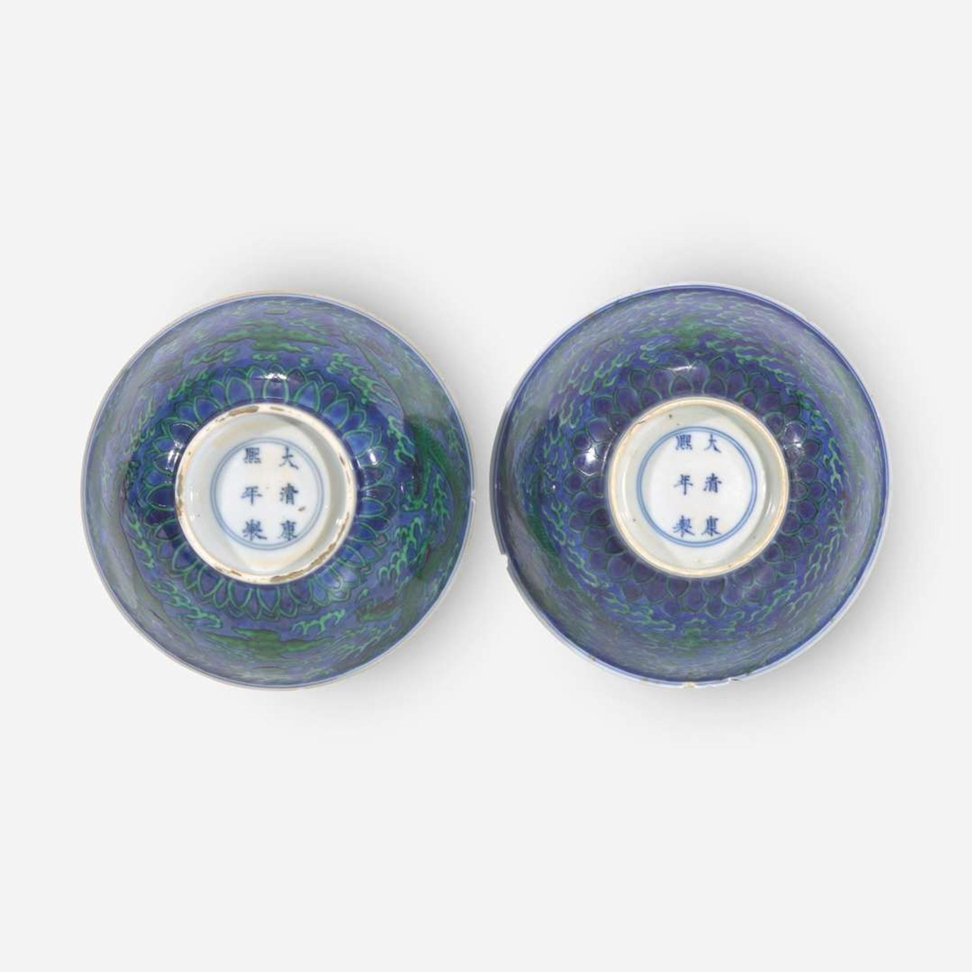 An associated pair of Chinese underglaze blue and green-enameled dragon bowls 珐琅彩青花龙纹碗一对 Kangxi six-character mark and of the period ????? ???