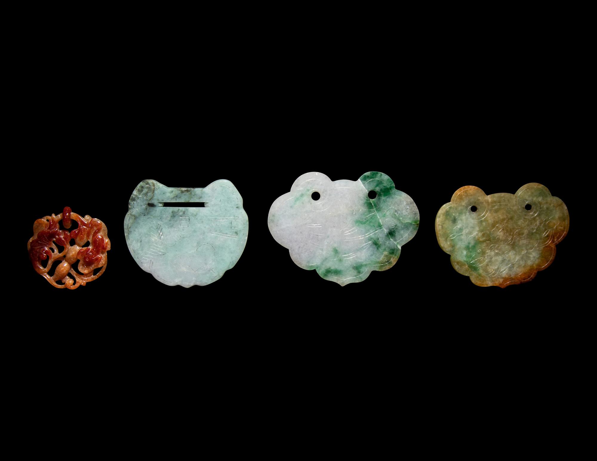 Four Chinese Jadeite Pendants