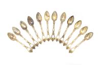 A Set of Twelve Continental Silver Demitasse Spoons, Length 4 5/8 inches.