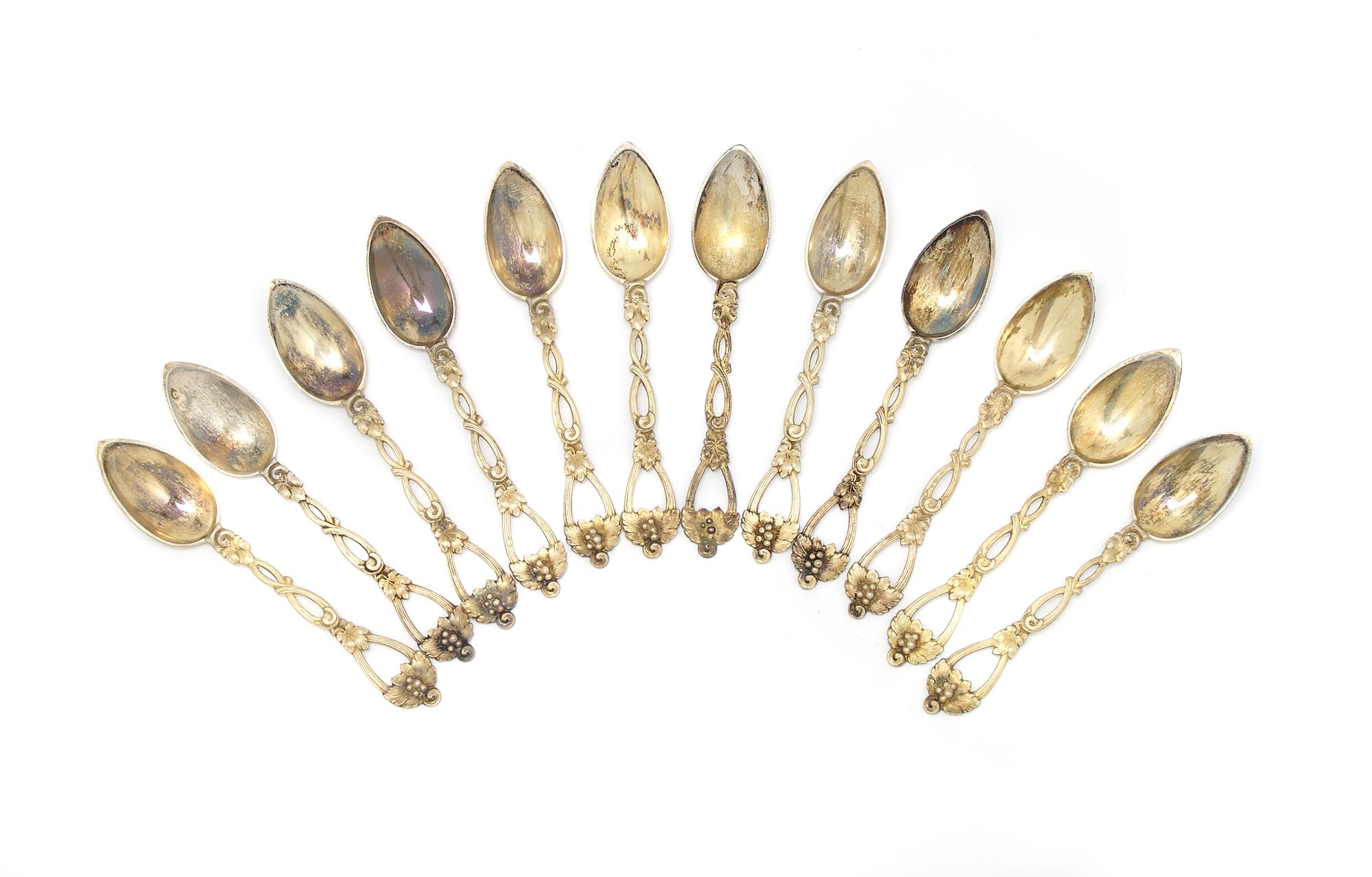 A Set of Twelve Continental Silver Demitasse Spoons, Length 4 5/8 inches.
