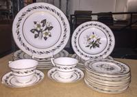 A Royal Worcester Partial Dinnerware Service for Twelve Diameter of dinner plates 10 1/2 inches.