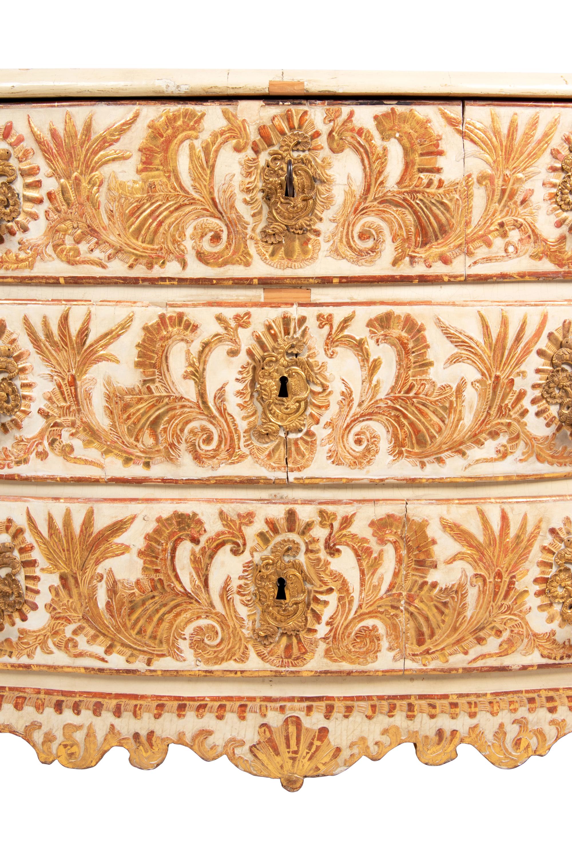 A Portuguese Baroque Gilt Bronze Mounted Painted and Parcel Gilt Commode