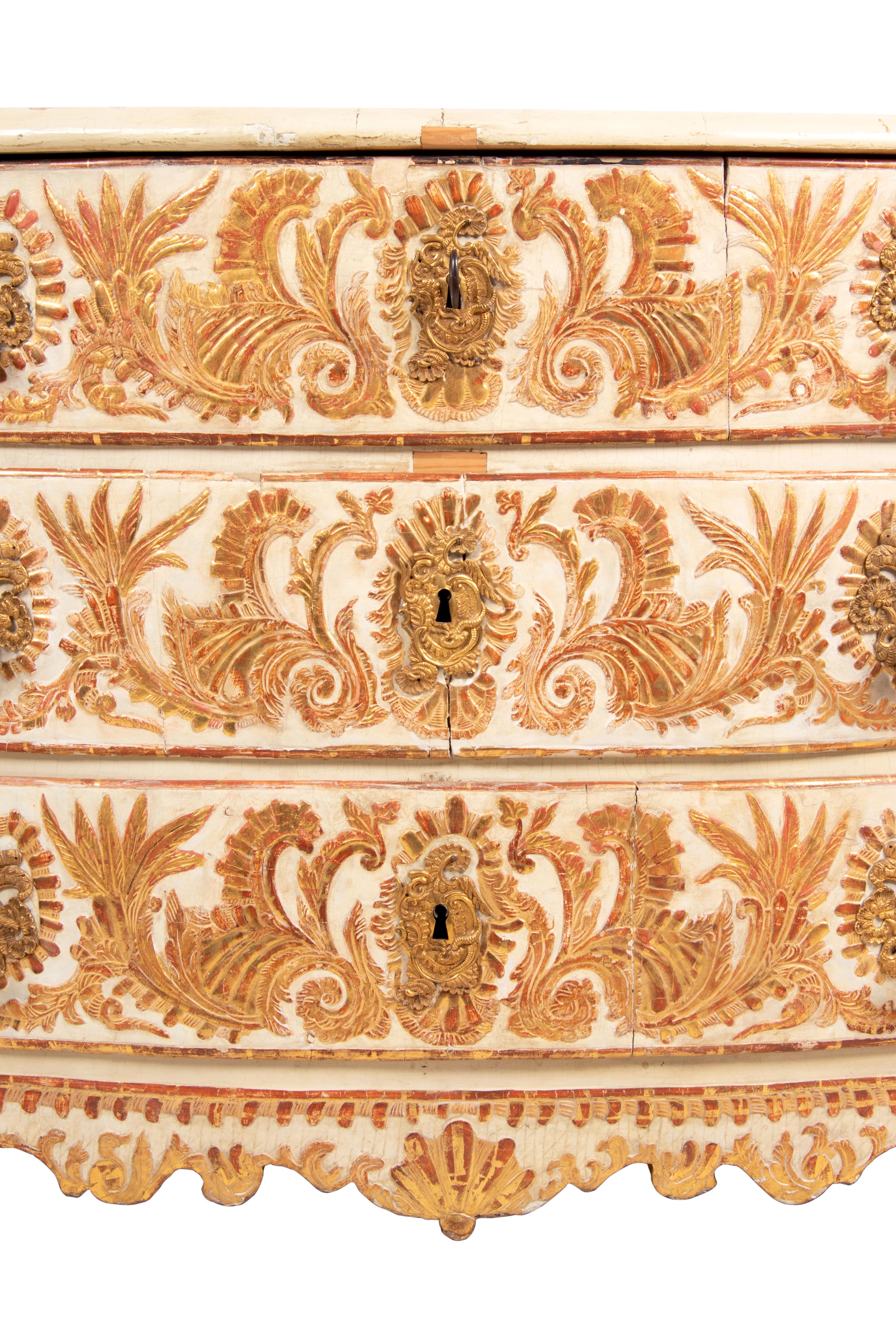 A Portuguese Baroque Gilt Bronze Mounted Painted and Parcel Gilt Commode