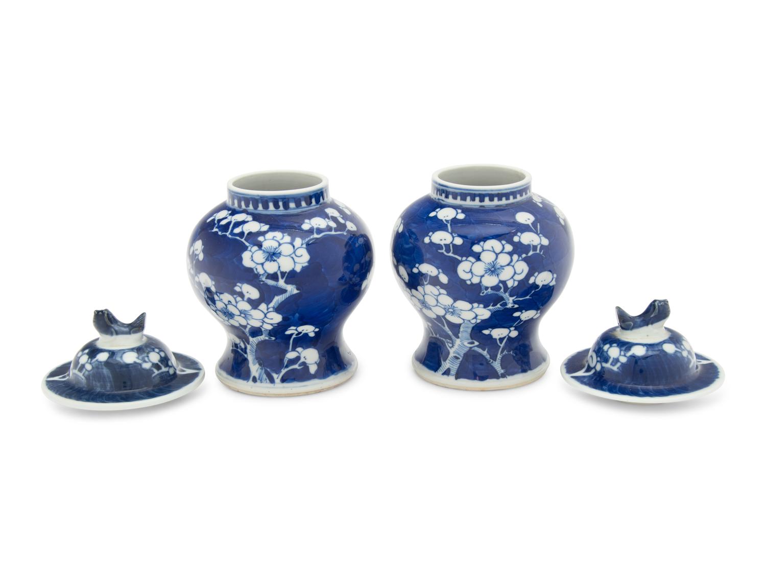 A Pair of Chinese Blue and White 'Cracked Ice and Prunus' Porcelain Covered Jars