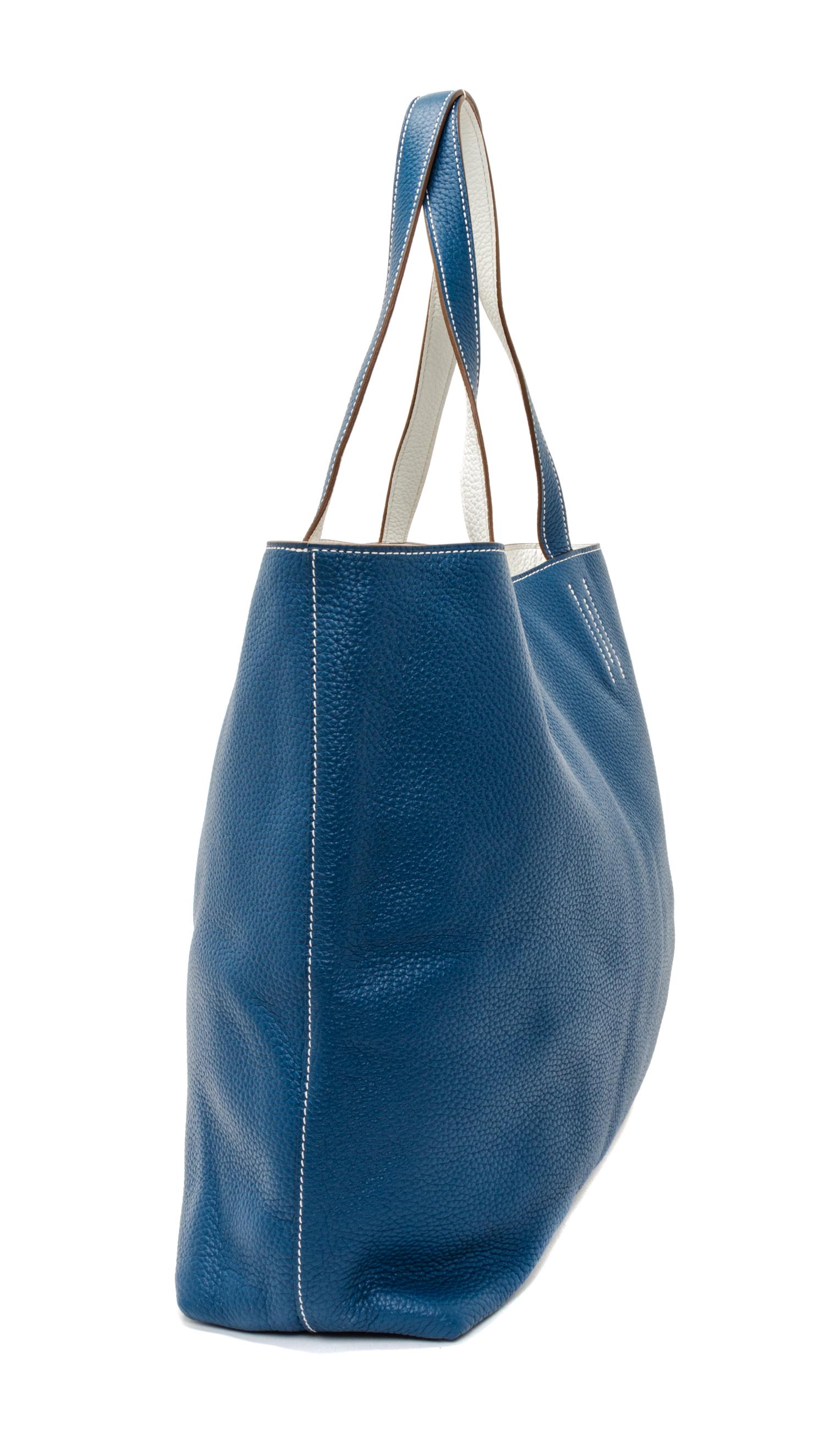 An Hermes Blanc/Bleu 45cm Taurillon Clemence Double Sens Tote, 17.5" x 15.5" x 5".