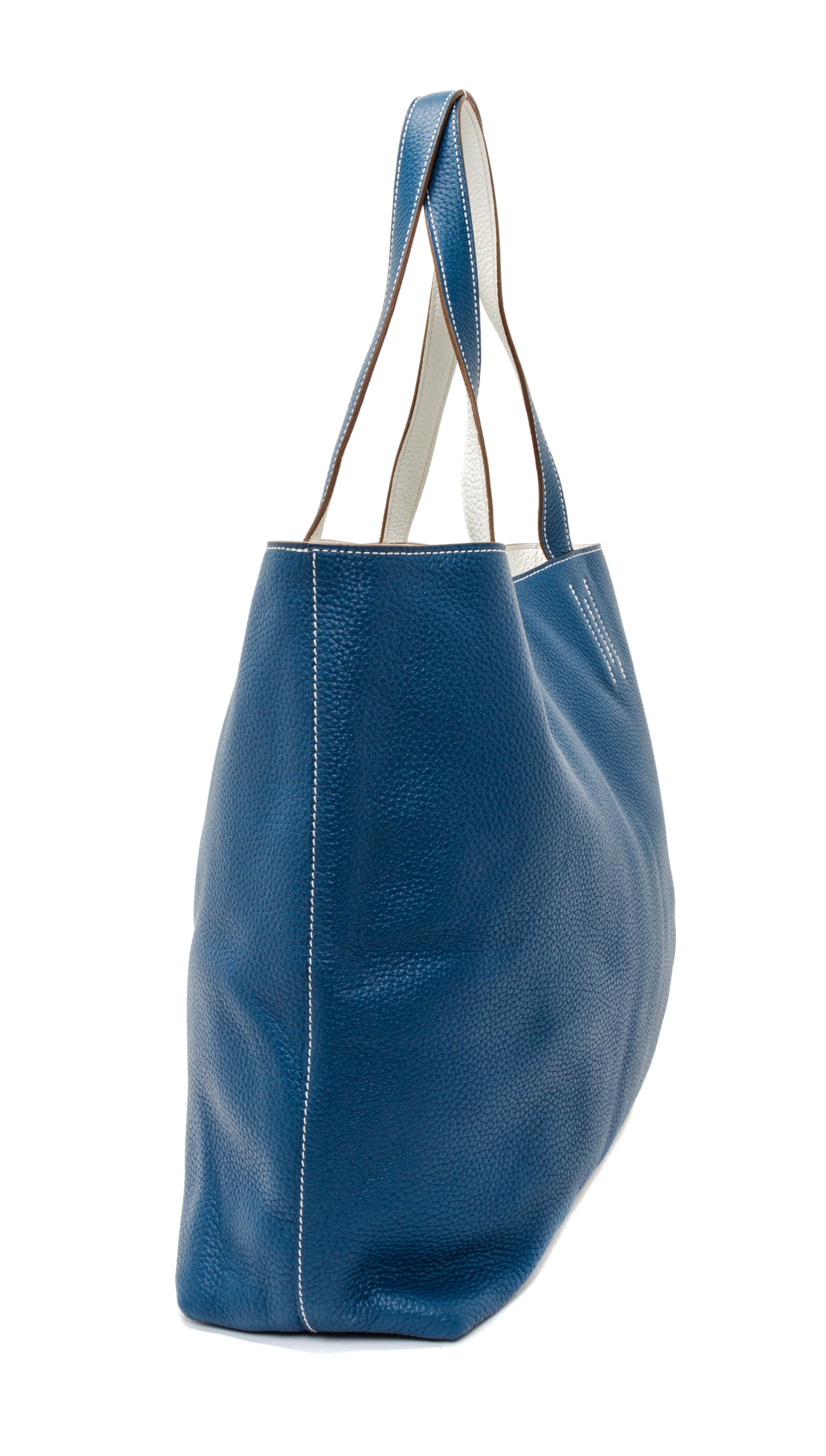 An Hermes Blanc/Bleu 45cm Taurillon Clemence Double Sens Tote, 17.5" x 15.5" x 5".
