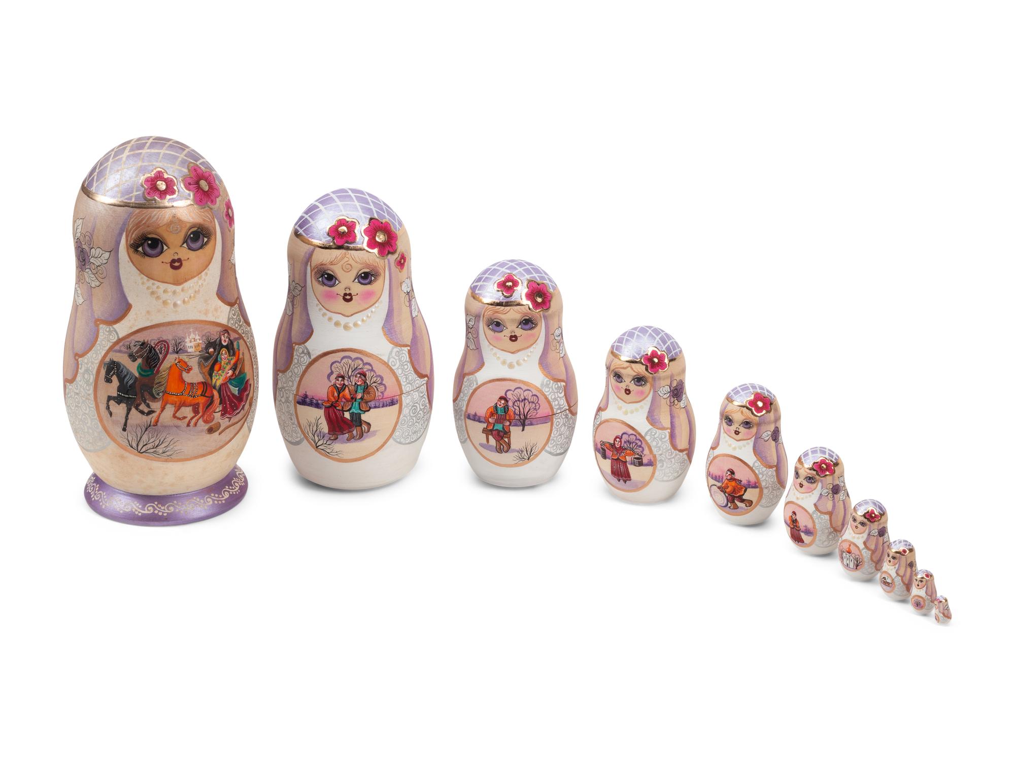 A Collection of Eight Russian Lacquer Matryoshka Nesting Dolls