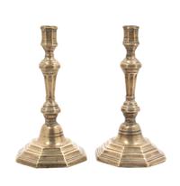 A Pair of George III Brass Candlesticks Height 9 inches.