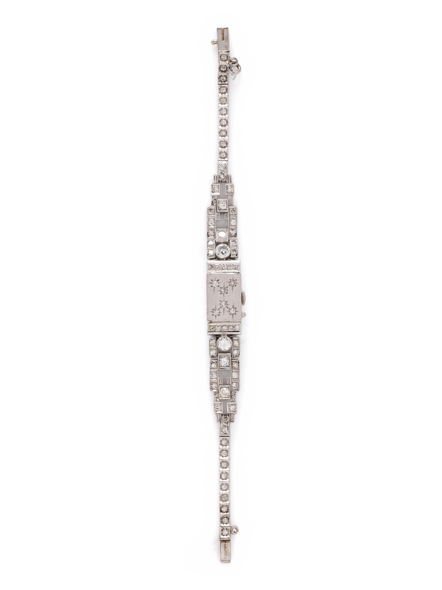 GENÈVE, WHITE GOLD AND DIAMOND SURPRISE WATCH