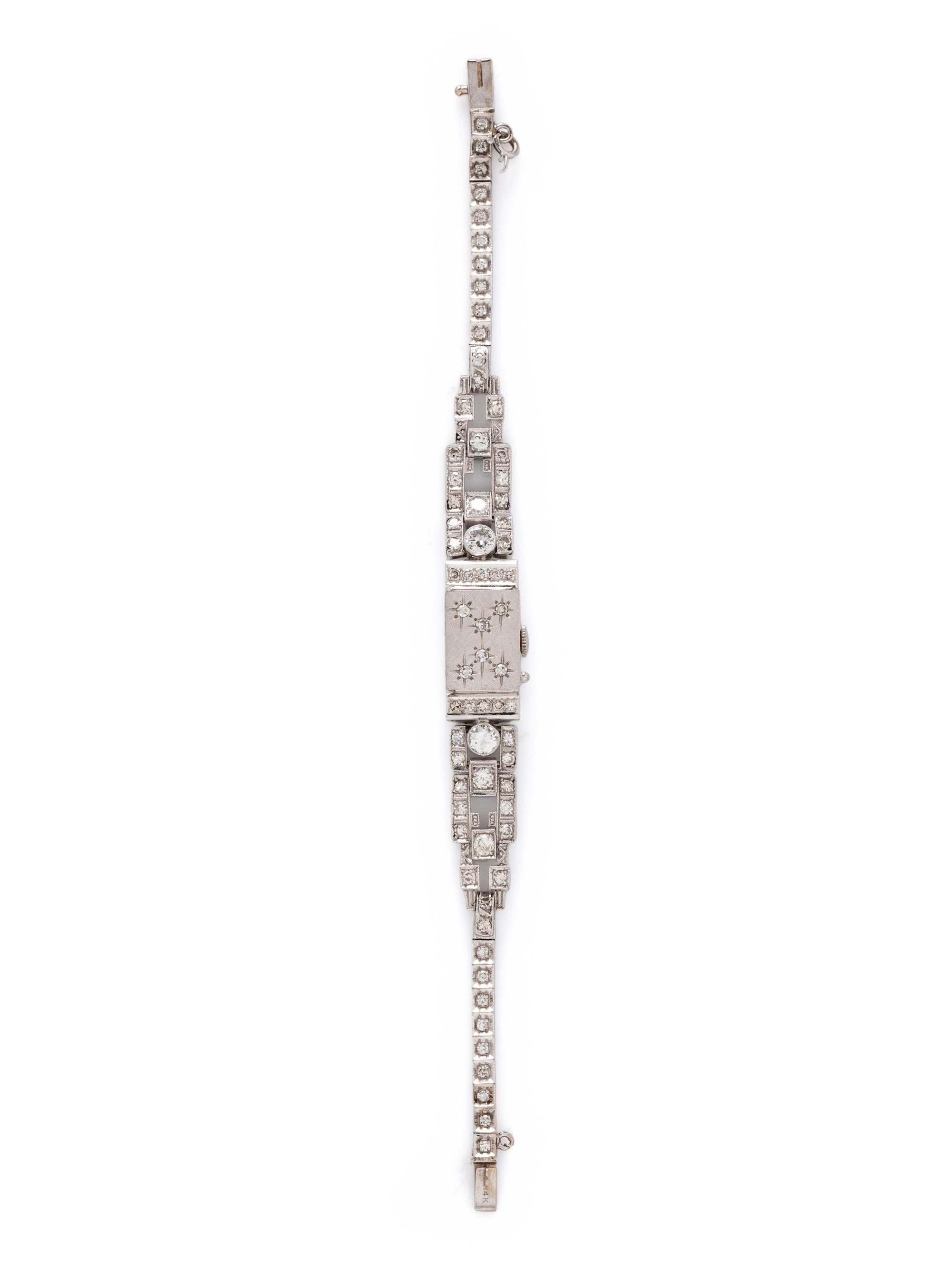 GENÈVE, WHITE GOLD AND DIAMOND SURPRISE WATCH
