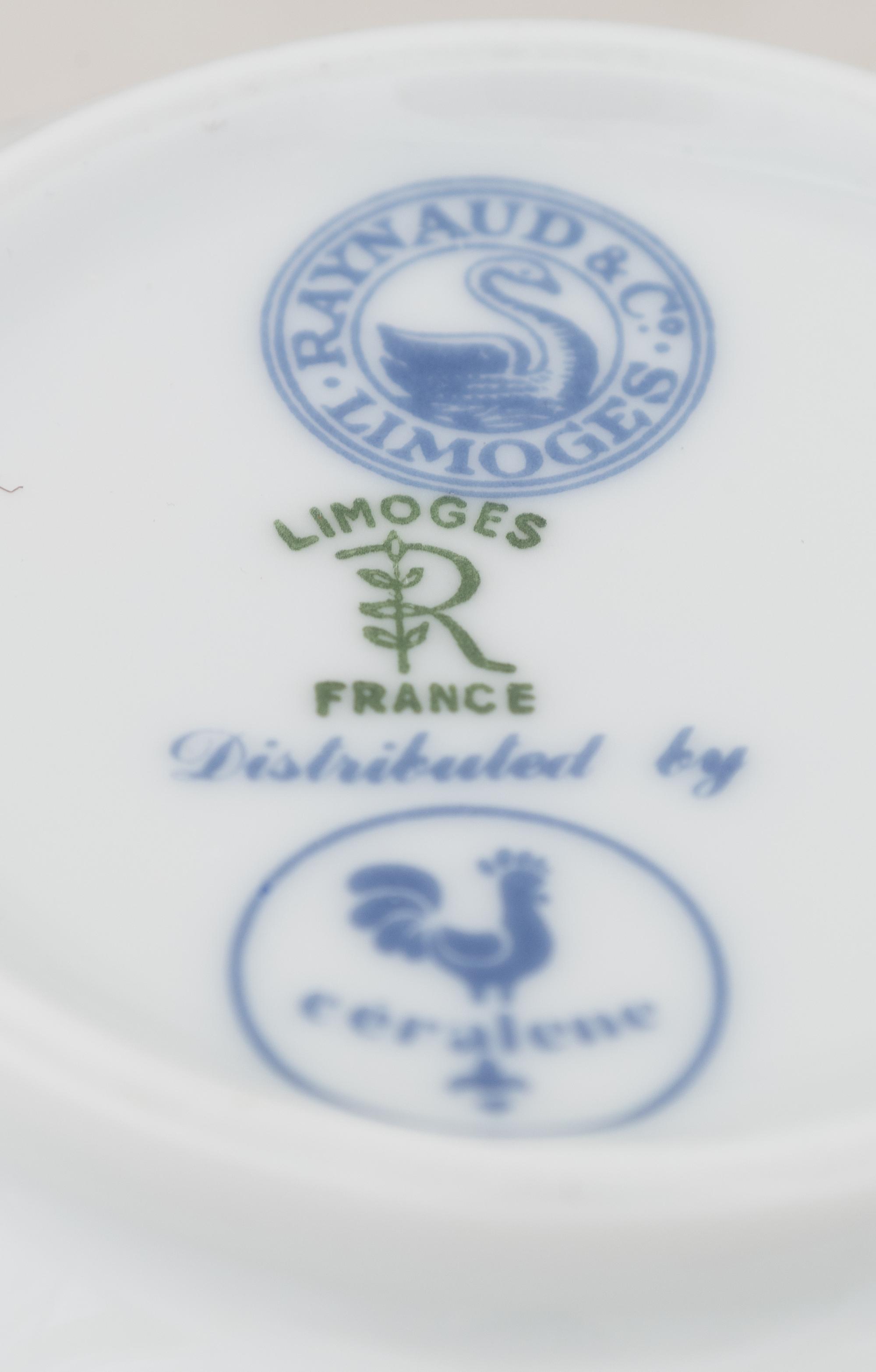A Raynaud Limoges Porcelain Dinner Service
