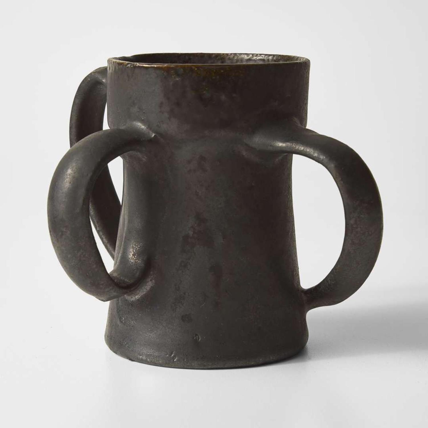 George Ohr (American, 1857-1918) Three-Handled Mug in Matte Gunmetal Glaze with Streaky Olive Interior, Biloxi, Mississippi, USA, circa 1898-1910
