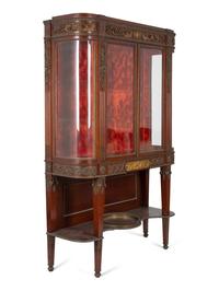 A Fine French Carved Mahogany Gilt Bronze Mounted and Glazed Curio Cabinet on Stand — CIRCA 1890