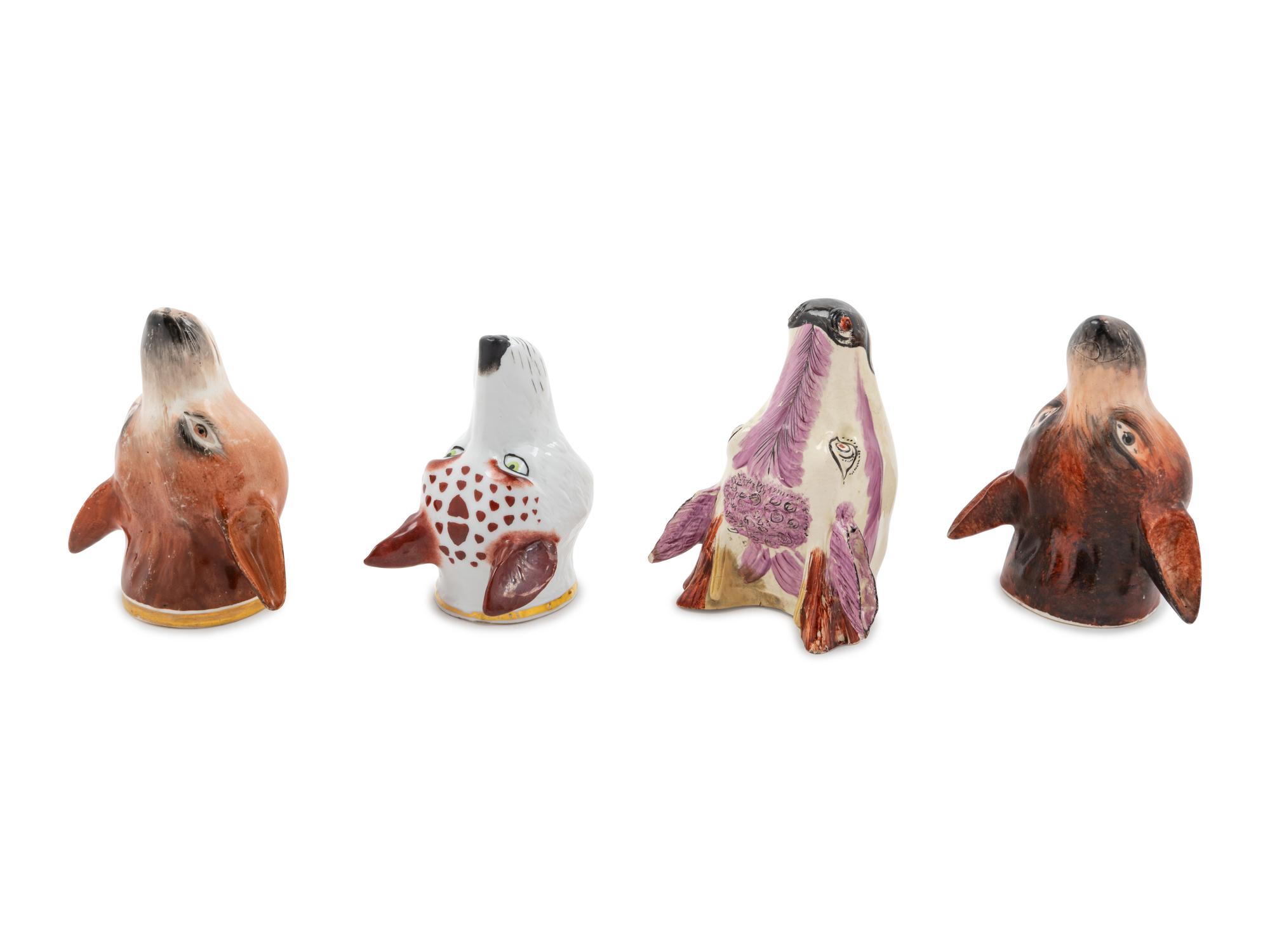 Four Staffordshire Pottery Stirrup Cups