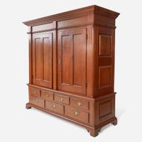 A Chippendale carved walnut cupboard Probably Lancaster County, PA, late 18th century