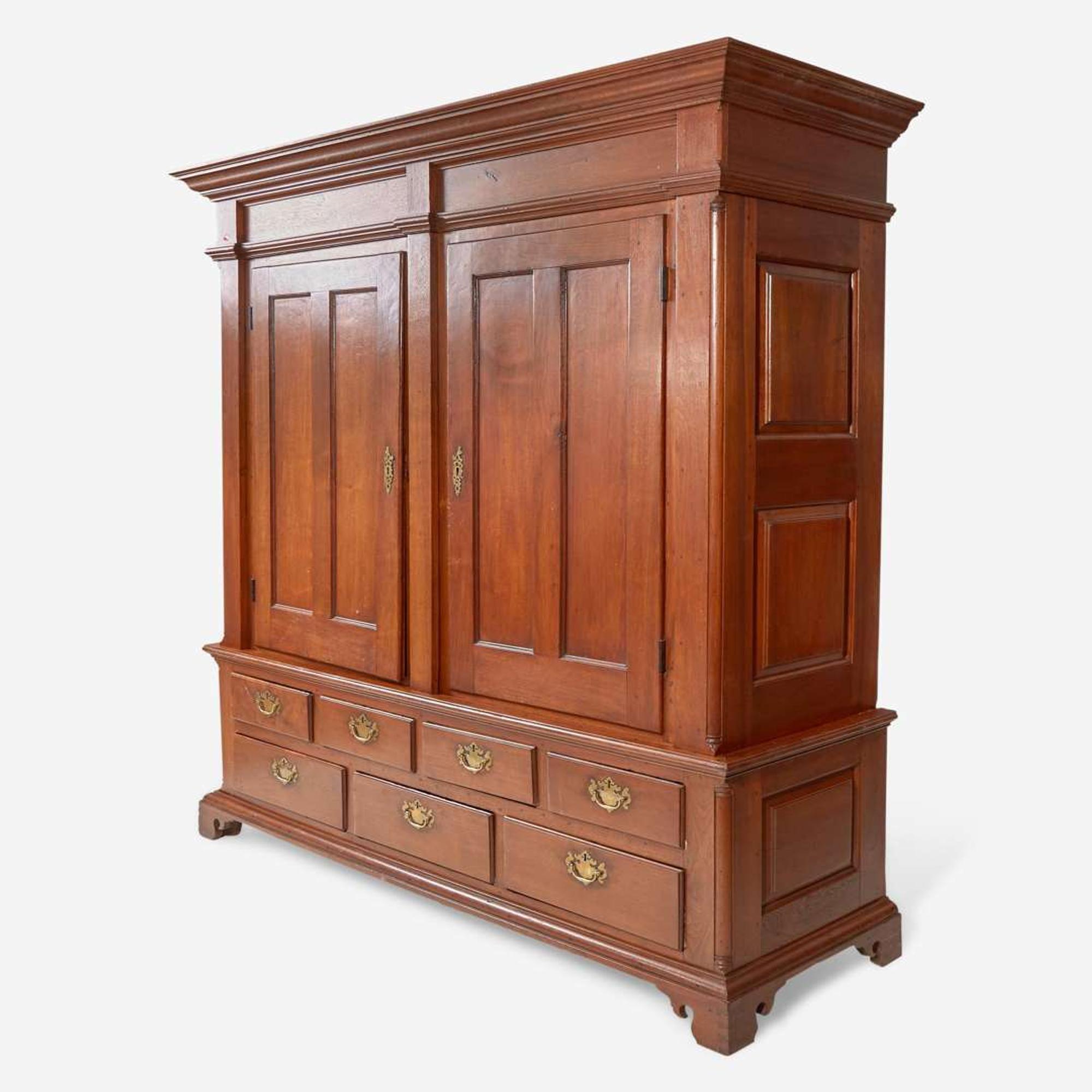 A Chippendale carved walnut cupboard Probably Lancaster County, PA, late 18th century