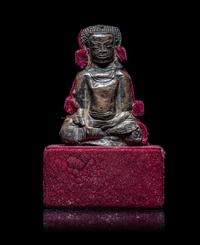 A Thai Silvered Metal Repoussé Plaque of Buddha