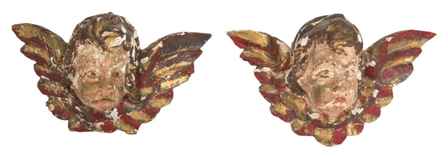 A Pair of Italian Painted and Parcel Gilt Putto Masks Height 6 x width 10 x depth 5 inches. — 18TH CENTURY