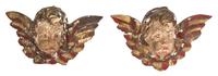 A Pair of Italian Painted and Parcel Gilt Putto Masks Height 6 x width 10 x depth 5 inches. — 18TH CENTURY