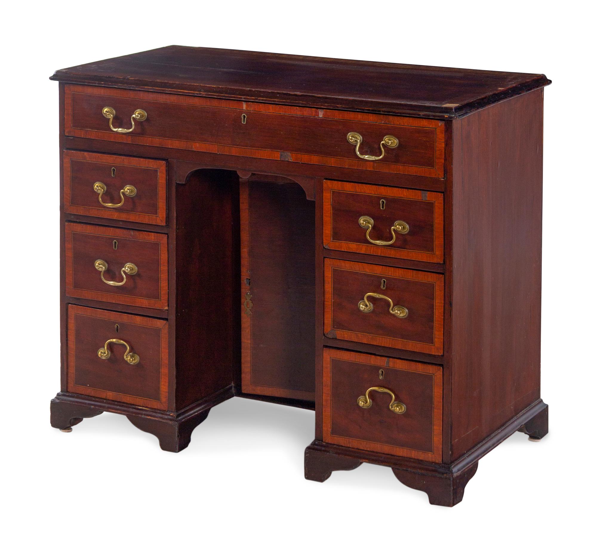 A George III Mahogany Kneehole Desk